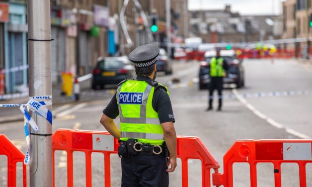 Police on Strathmartine Road