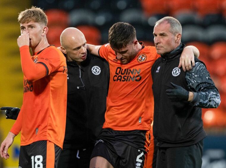 Ryan Strain of Dundee United in pain