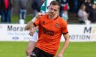 Dundee United's Kristijan Trapanovski wheels away after finding the net against Buckie Thistle