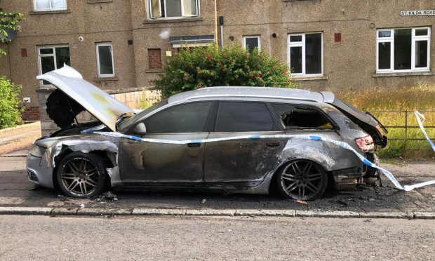 The fire-damaged car on St Kilda Road in Dundee. Image: James Simpson/DC Thomson