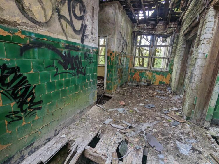 Gayle coveted some of the stunning green tiles, still intact, inside abandoned Thornton Fever Hospital. Image: Gayle Ritchie.