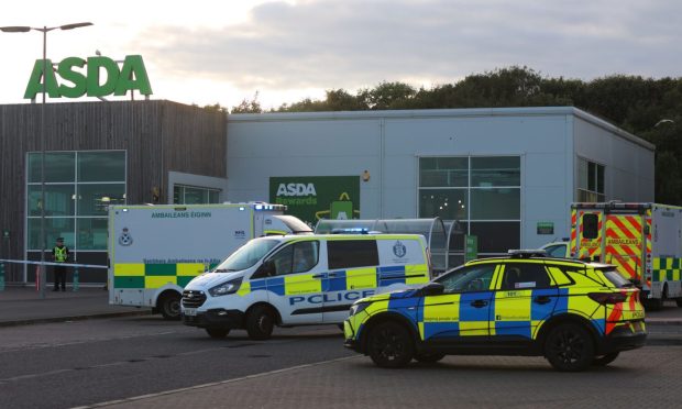 Police and ambulance vehicles at Asda in Arbroath. Image: Wallace Ferrier