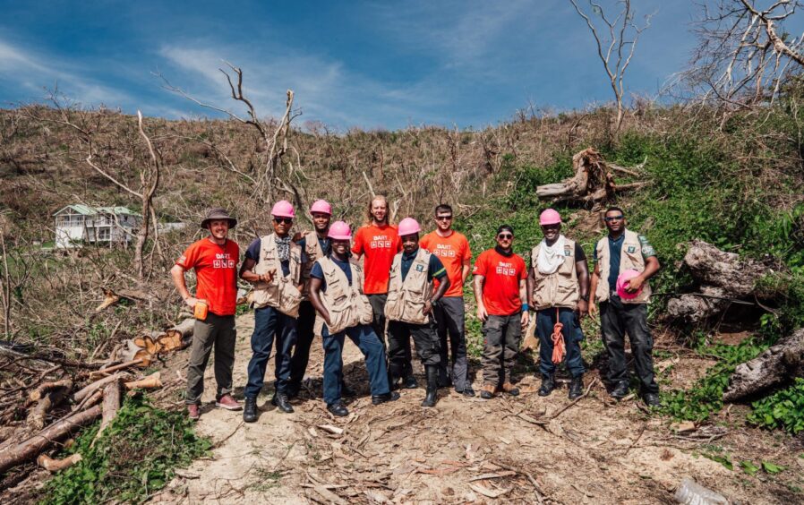 International arborists emergency team help Hurricane Beryl islanders.