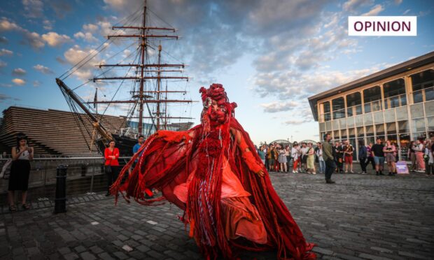 Saoirse Amira Anis, who exhibited at the DCA in 2023, channels her bodily experience of rage through a mythical creature as it tries to return to the sea and moves along Dundee’s waterfront. Image: Mhairi Edwards/DC Thomson