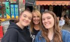 Eljamel campaigner with her daughters Sophie, left, and Emma, right.