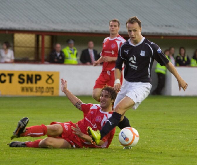 Dundee striker Leigh Griffiths is denied by Brechin defender Ewan Moyes back in 2010. 