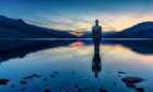 Mirror Man sculpture on Loch Earn at sunset