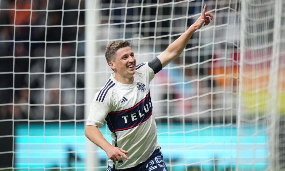 Ryan Gauld celebrates one of his nine goals this season