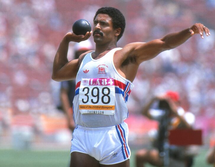 Thompson with the shot put at the 1984 Olympics