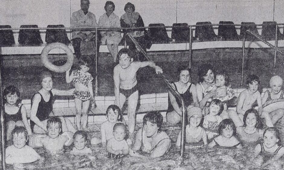 Swimmers having fun on the opening day in 1974. 