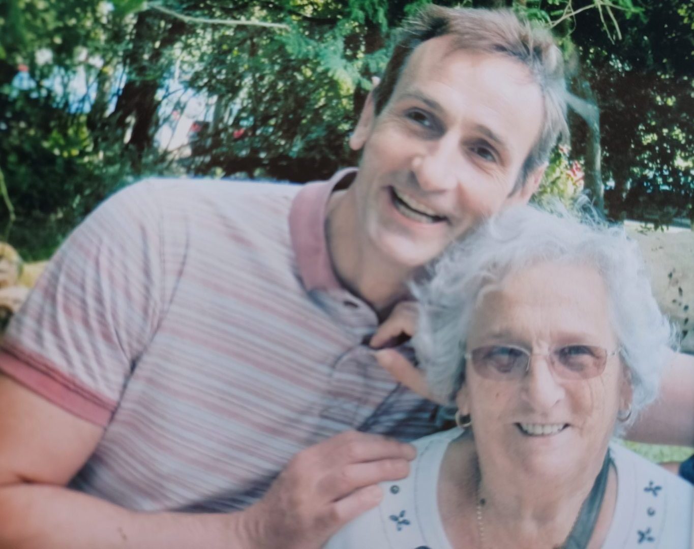 Dundee Community Cars driver Alan Mitchell with his late mum Ena. 