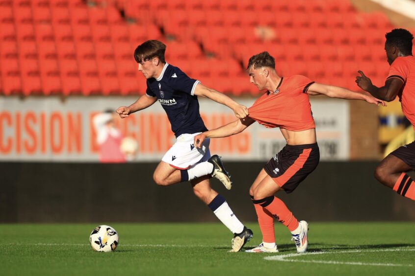 Finlay Allan takes the game to United in the Wee Derby. Image: David Young