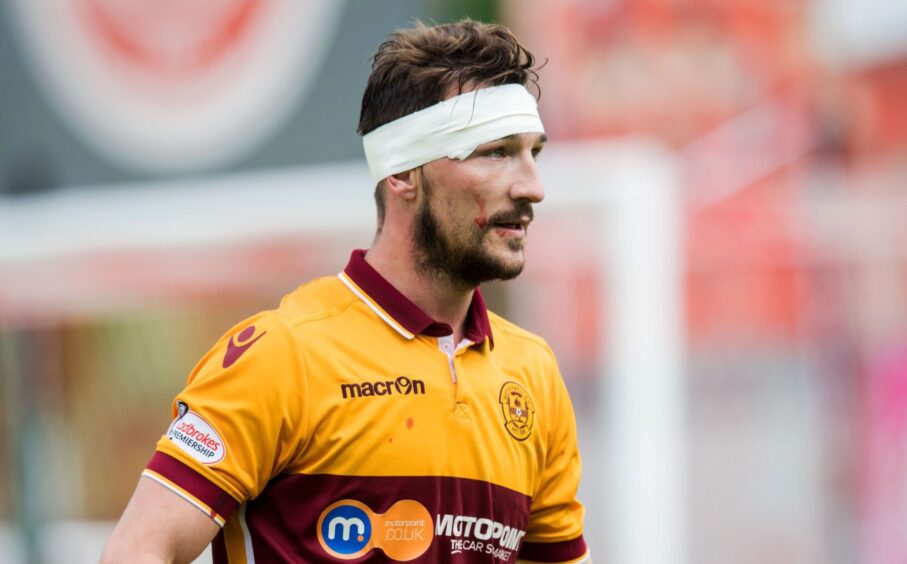 Craig Clay sports a bandage round his head during a Motherwell game in 2017.