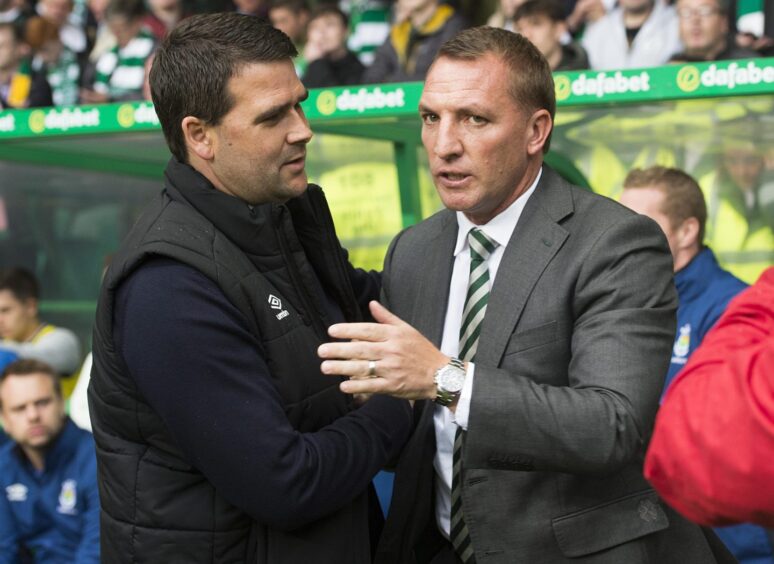 David Healy shakes hands with Celtic boss Brendan Rodgers in 2017.