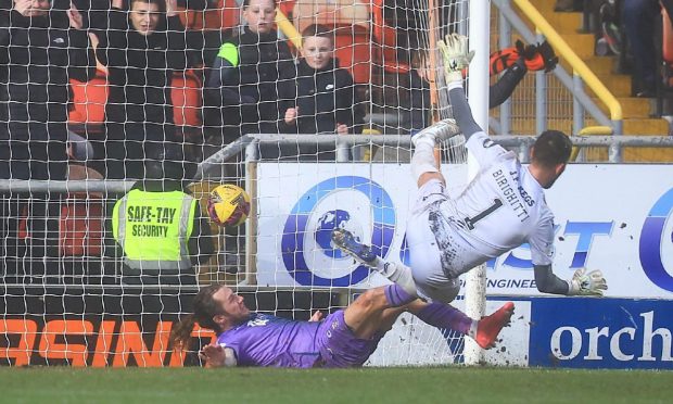 Dundee United keeper Birighitti is set head over heels by Stevie May