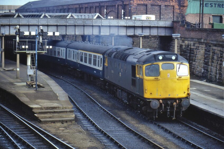 Type 2 diesel locomotive pulling a train in 1981. 