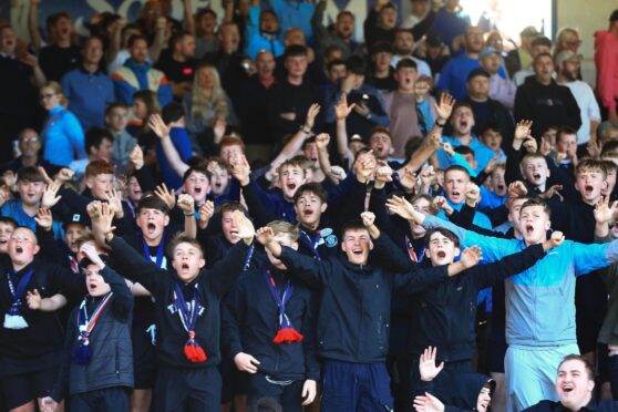 Dundee fans enjoy their side's win over Hearts. Image: David Young/Shutterstock