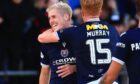 Luke McCowan and Simon Murray celebrate as Dundee go three up against Hearts. Image: David Young/Shutterstock