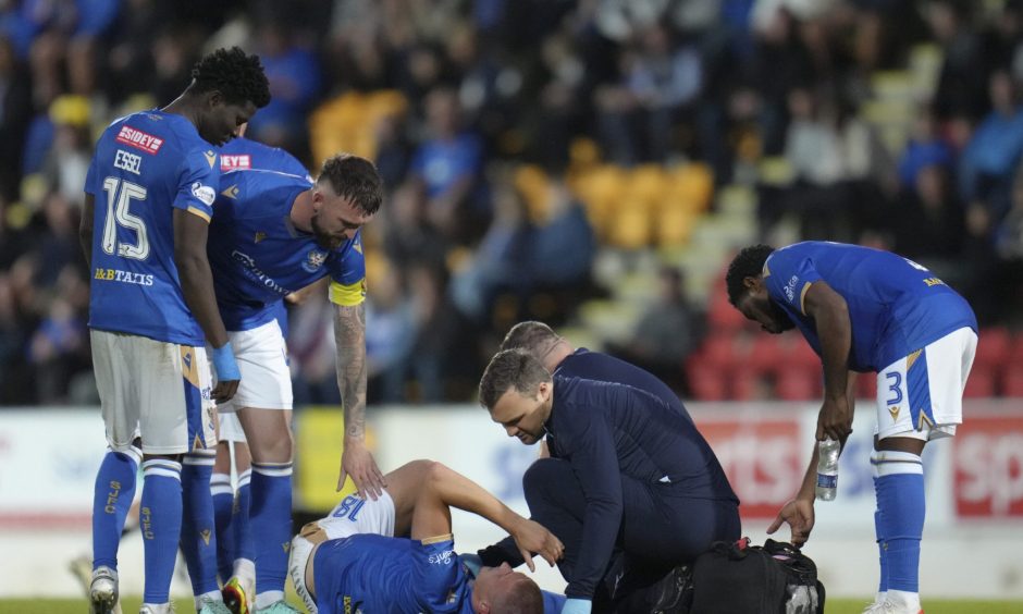 St Johnstone centre-back Sam McClelland on the ground after suffering a serious injury against Aberdeen.