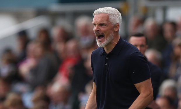 Dundee United boss Jim Goodwin cuts a frustrated figure.