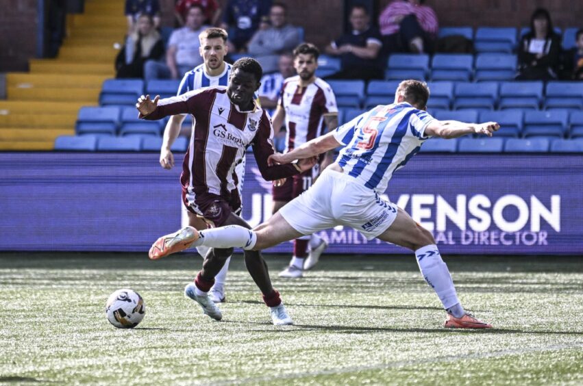 Benji Kimpioka earns his team a penalty at Rugby Park.