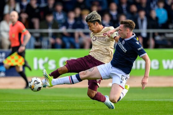 Jordan McGhee denies Yutaro Oda as Dundee defeat Hearts. Image: Shutterstock