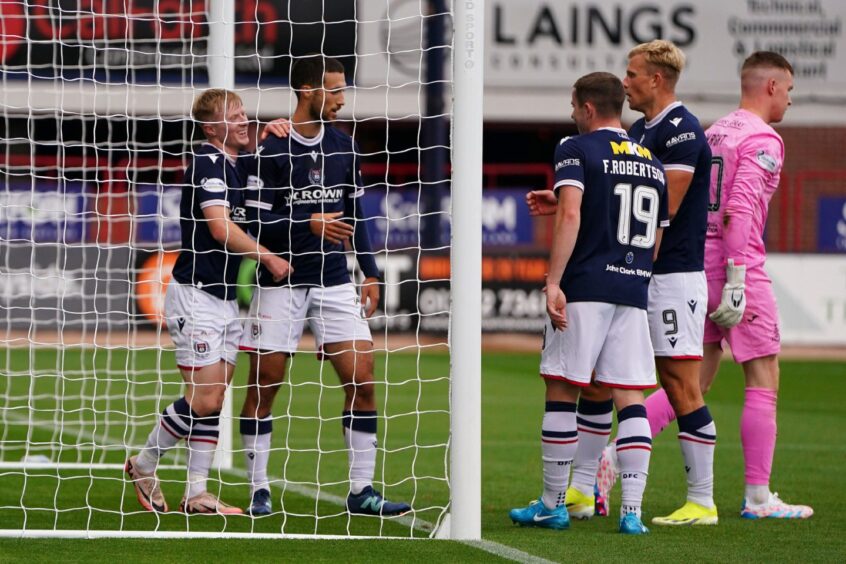 Dundee celebrate Lyall Cameron's goal making it 6-1 against Airdrieonians. Image: David Young/Shutterstock