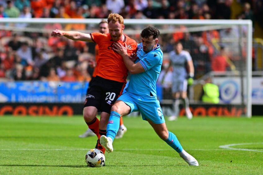 Jort van der Sande battles for the ball for Dundee United