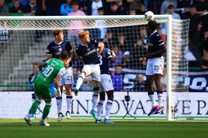 Ex-Dee Martin Boyle finds the top corner against Dundee. Image: David Young/Shutterstock