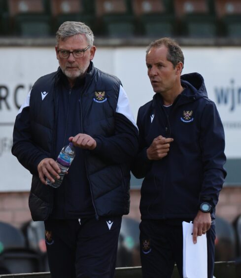 Craig Levein with coach, Alex Cleland.