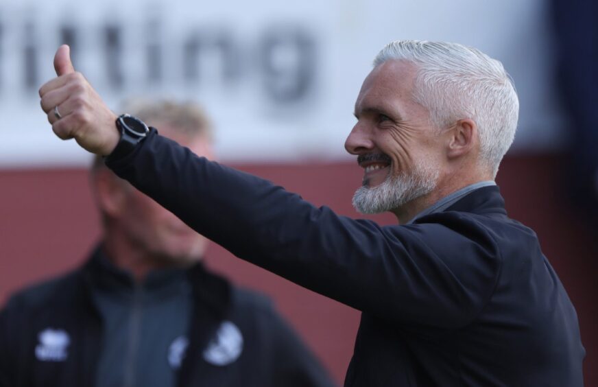 Dundee United manager Jim Goodwin is all smiles