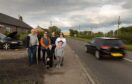 Balwyllo residents beside the busy A935. Image: Paul Reid