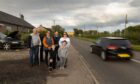 Balwyllo residents beside the busy A935. Image: Paul Reid