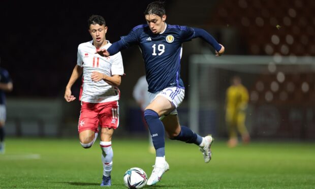 Kieron Bowie in action for Scotland U/21s.