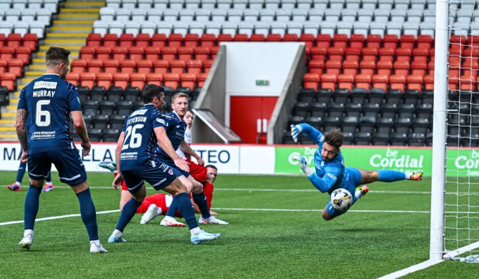 Dylan MacDonald scores Airdrie's winner against Raith Rovers.