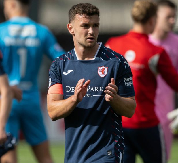 Ross Matthews claps the Raith Rovers supporters.