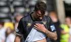 Dunfermline Athletic F.C. skipper Kyle Benedictus looks dejected after defeat to Livingston.