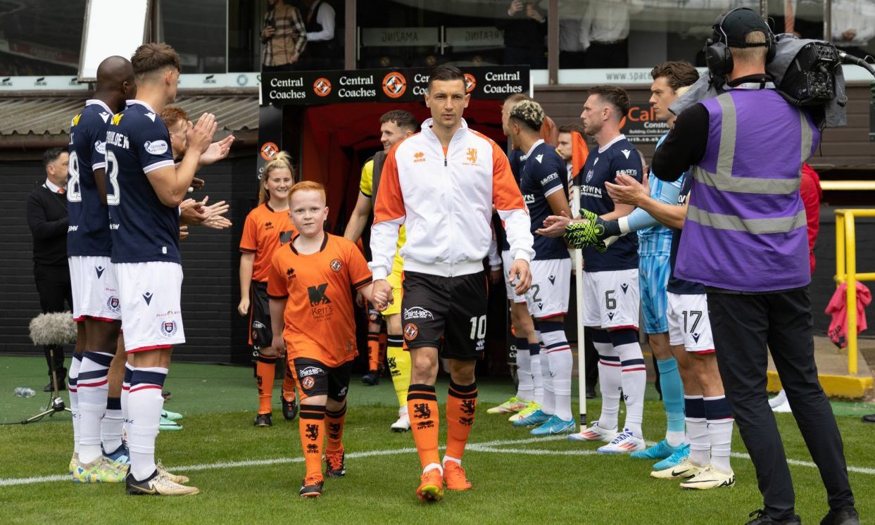 David Babunski leads out Dundee United on derby day