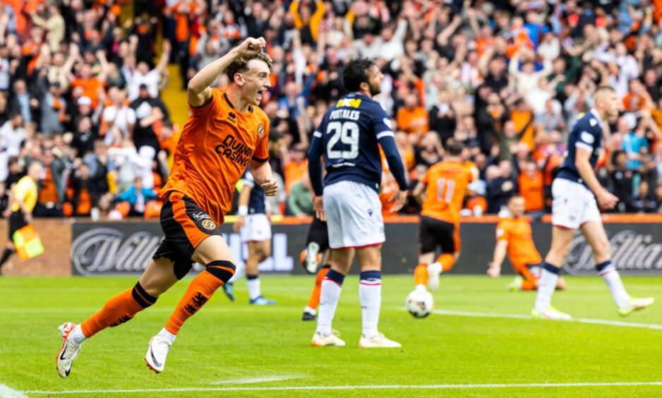 MIller Thomson wheels away following his first ever Dundee United goal