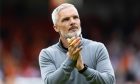 Jim Goodwin applauds the Dundee United faithful.