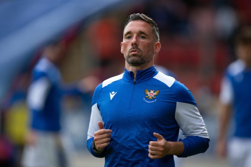 St Johnstone striker, Nicky Clark warming up