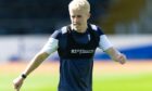 Luke McCowan training at Dens Park during Dundee's opening training session on Tuesday. Image: SNS