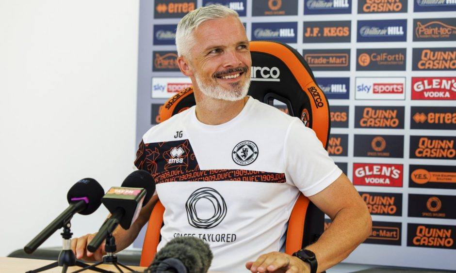 All smiles: Jim Goodwin secured defensive reinforcements this week.