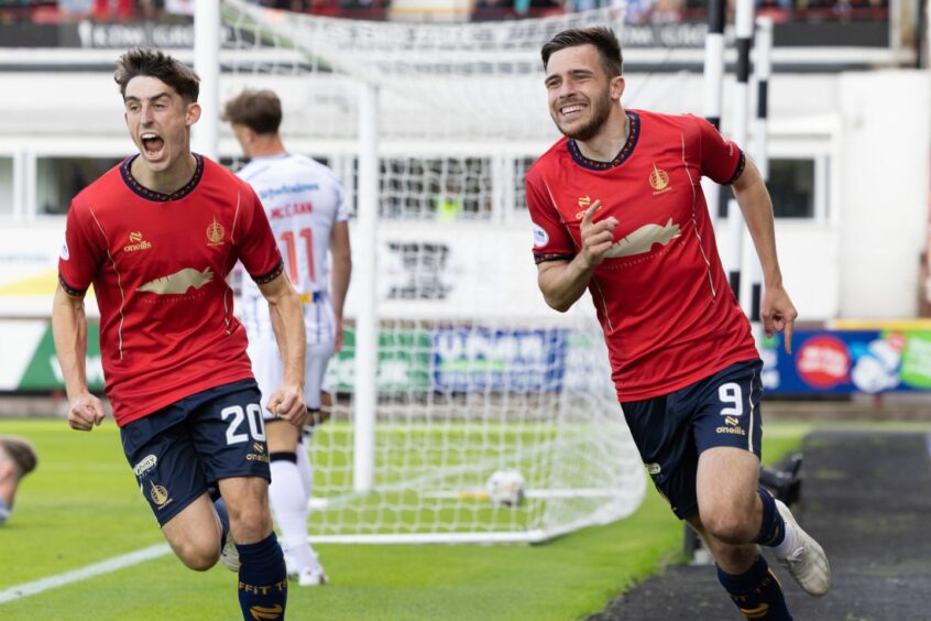 Ross MacIver runs away after scoring Falkirk's early opening goal.