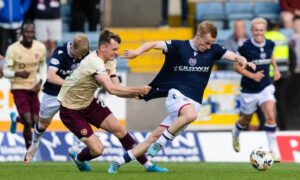 Hearts struggled to get to grips with Scott Tiffoney. Image: SNS