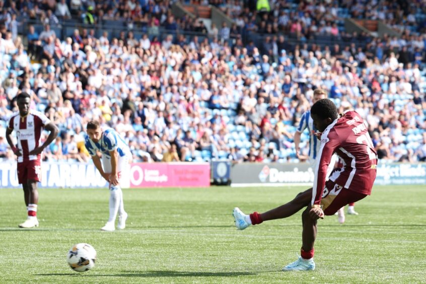 Benji Kimpioka tucks away his penalty. 