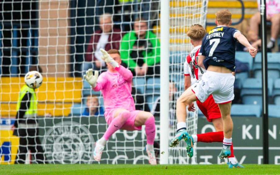 Scott Tiffoney smashes in Dundee's third goal. Image: Ewan Bootman/SNS