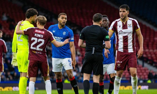 The St Johnstone players were furious that Rangers' opening goal was given.