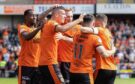 Ross Graham takes the acclaim of his Dundee United teammates