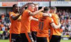 Ross Graham takes the acclaim of his Dundee United teammates